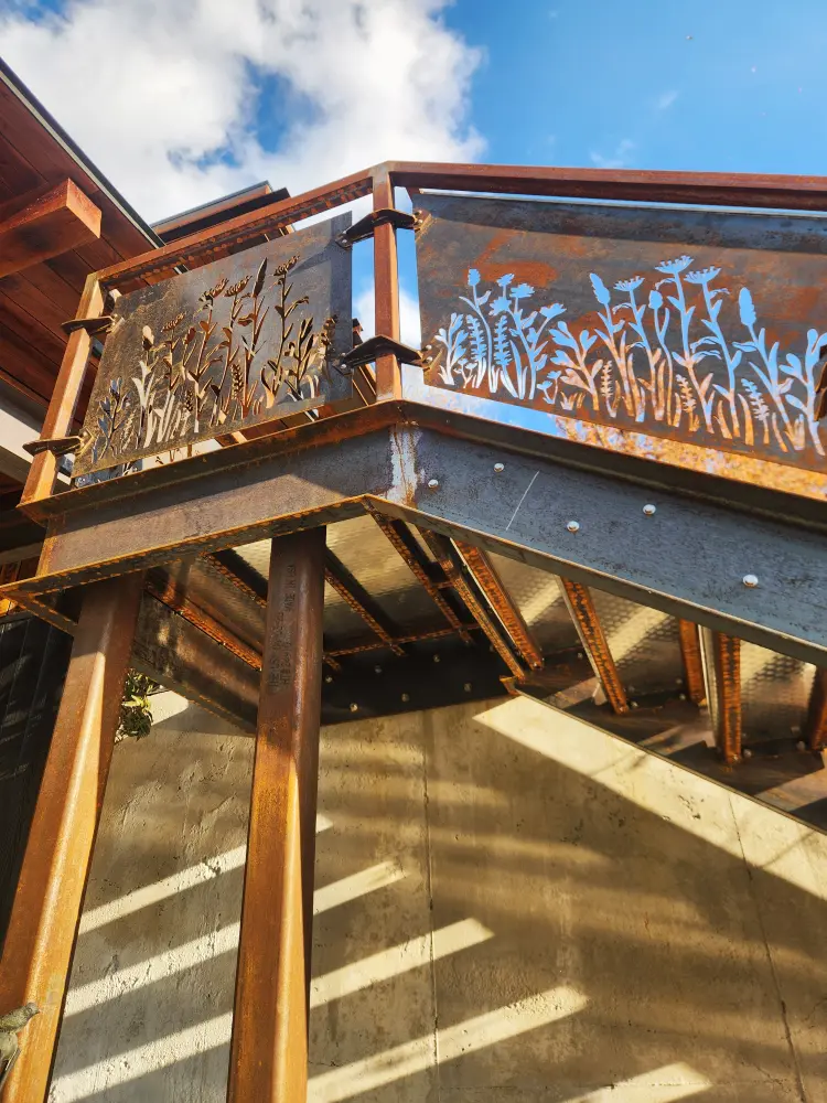 Custom Corten Exterior Stairs and Railings with Laser Cut Design and Decorative Brackets/Hardware