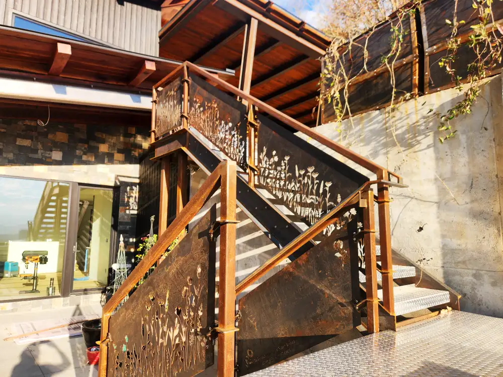 Custom Corten Exterior Stairs and Railings with Laser Cut Design and Decorative Brackets/Hardware