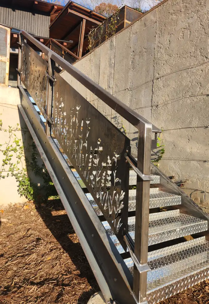 Custom Corten Exterior Stairs and Railings with Laser Cut Design